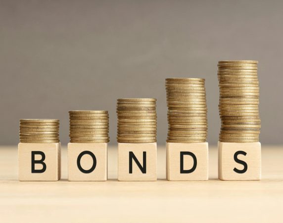 stacked change on top of the word bonds